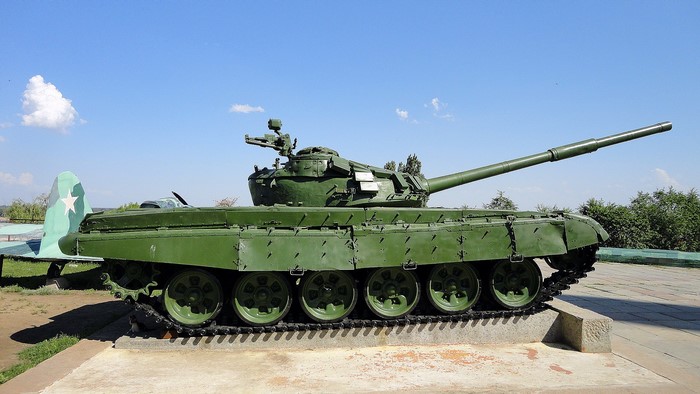 Green military tank on display