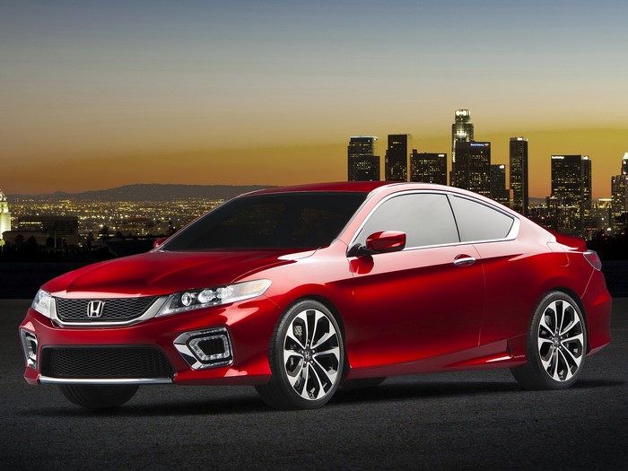 Red Honda Accord Coupe in front of Los Angeles skyline