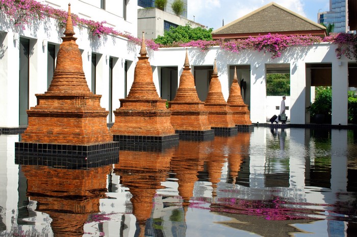 Resorts with brick stupas and reflecting pool
