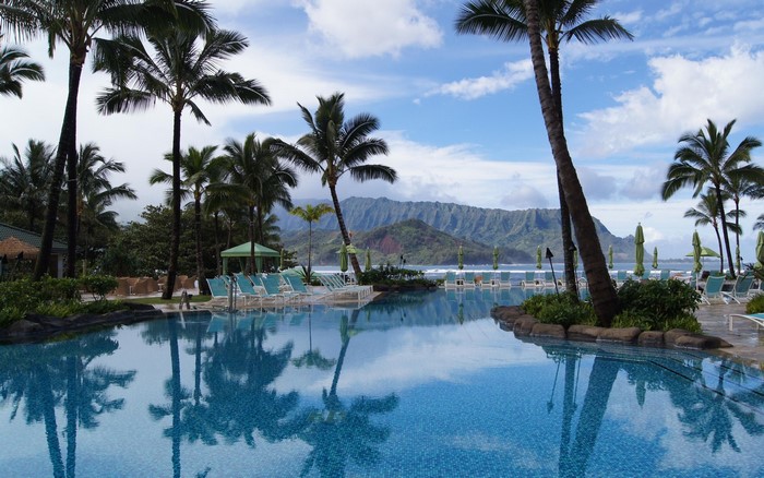 Kauai Luxury Hotel Pool with Palm Trees and Mountains