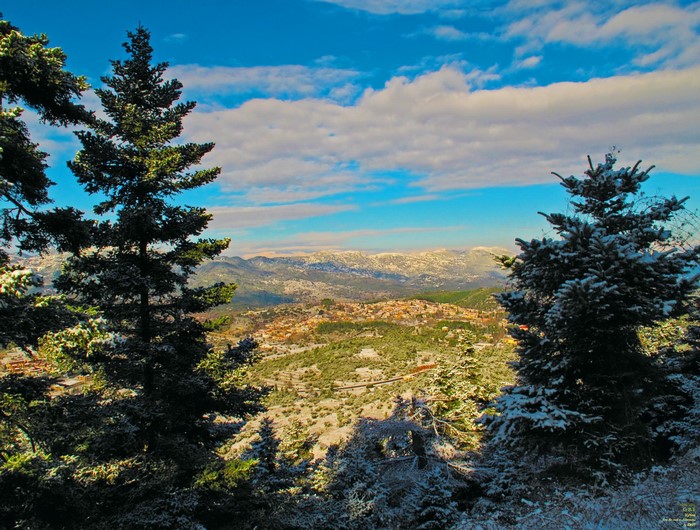 Snowy Mountains and Village View
