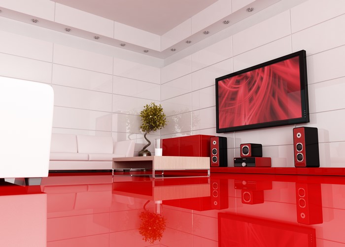 Modern living room with red accents and TV