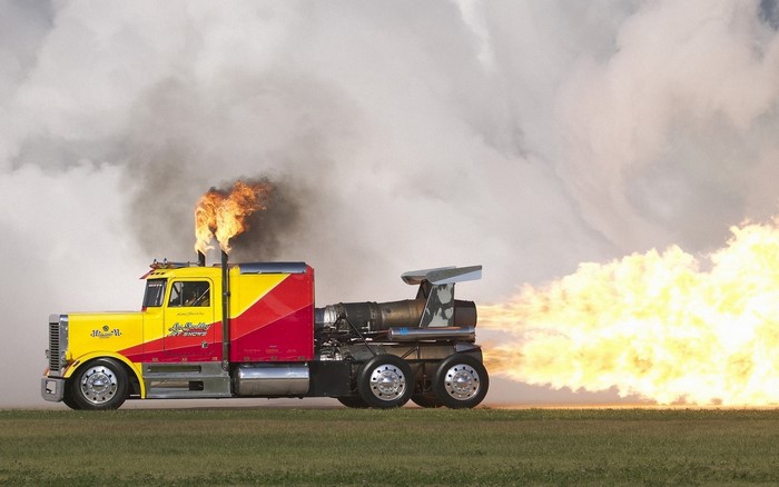 Jet-powered truck with flames and smoke
