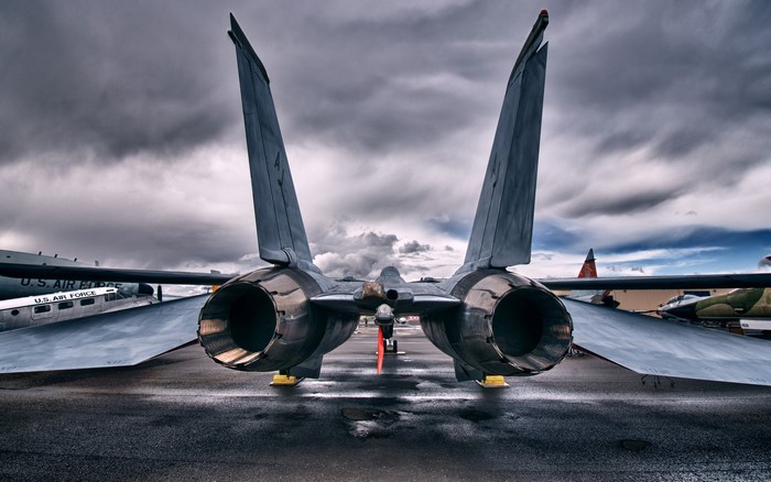 Rear view of a fighter jet on tarmac