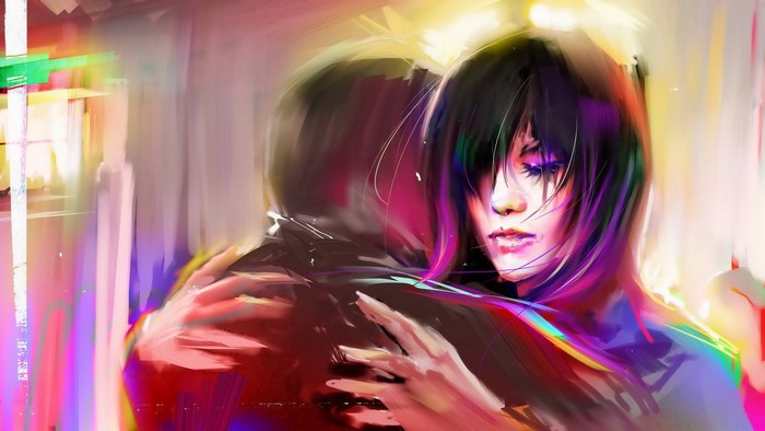 Couple embracing with colorful abstract background