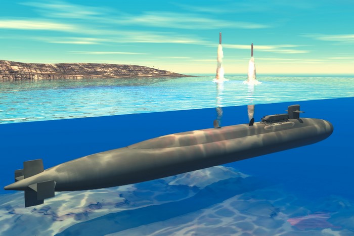 Submarine launching missiles near island