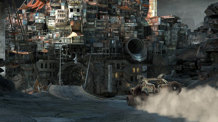 A buggy kicks up dust in a post-apocalyptic city