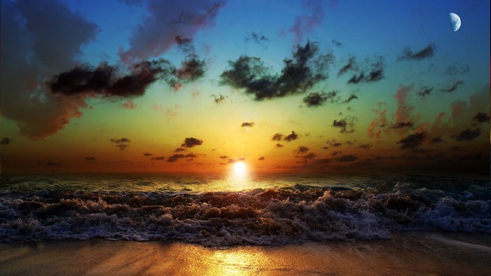 Sunset over the ocean with moon