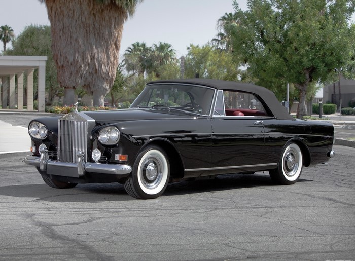 Black Rolls-Royce convertible parked outdoors