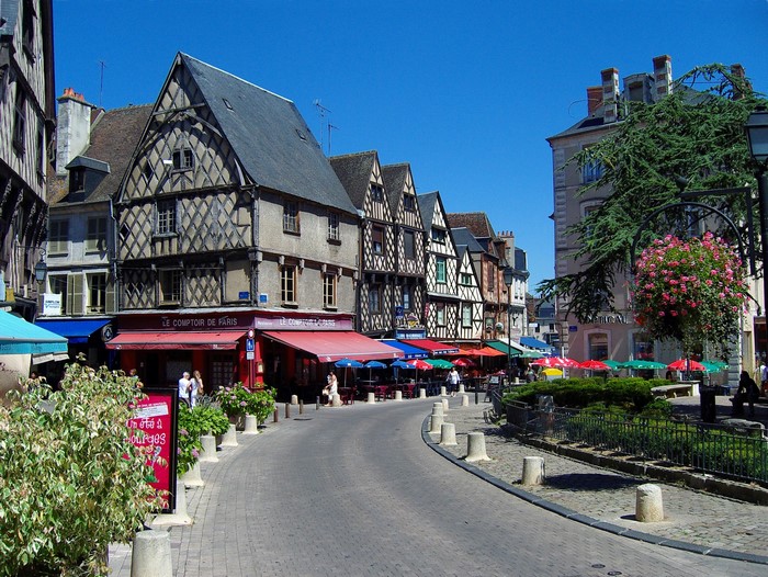 Street scene in France with half-timbered buildings