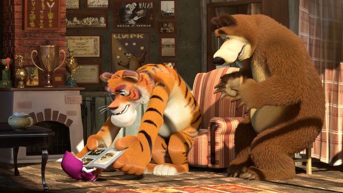 Masha and the Bear looking at a photo album