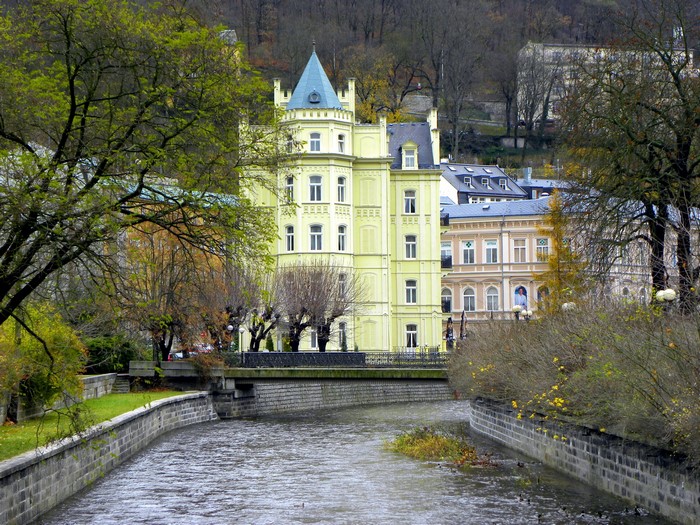 Yellow building by river in Karlovy Vary, Czech Republic