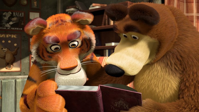 Tiger and Bear from Masha and the Bear reading a book