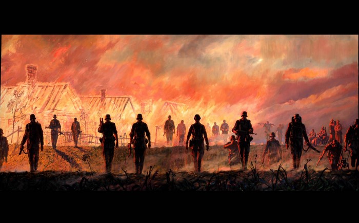 Soldiers walking through burning village