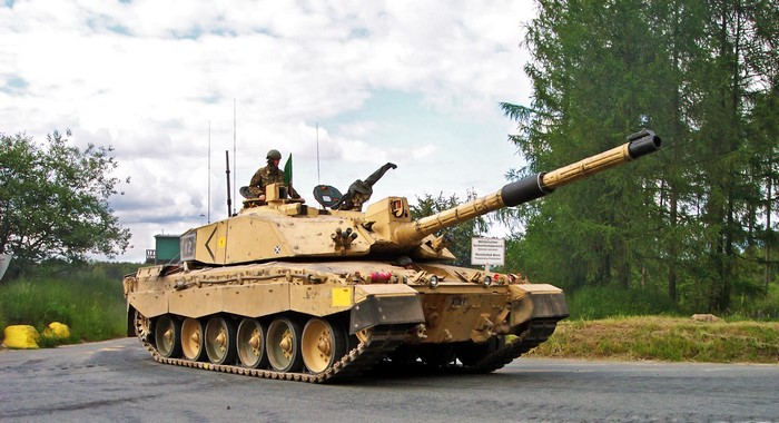 Challenger 2 tank with crew on a road