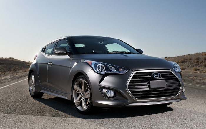 Gray Hyundai Veloster parked on a road