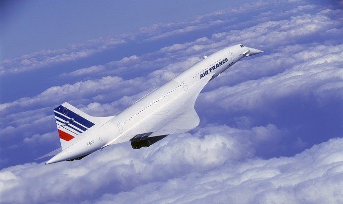 Air France Concorde Supersonic Jet Flying Above Clouds