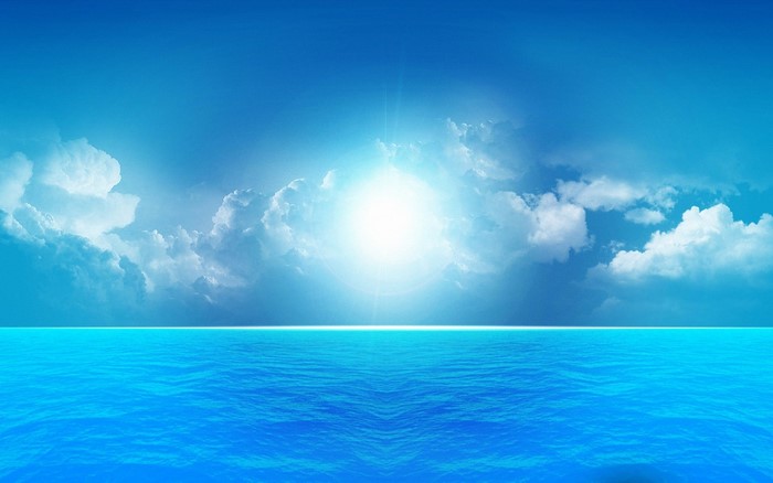 Bright sun over the ocean horizon