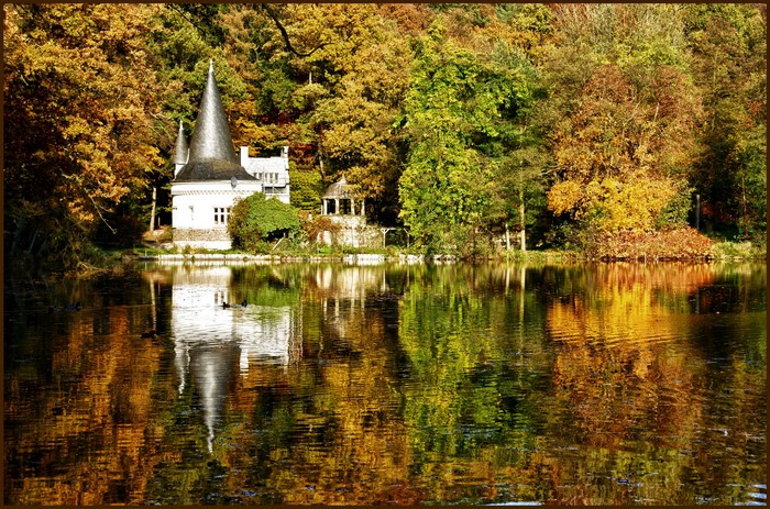 Castle by a lake in Germany during autumn