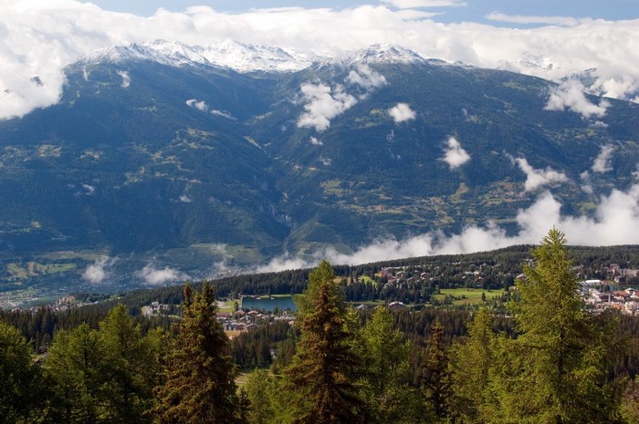 Mountain landscape with villages and lake in Switzerland