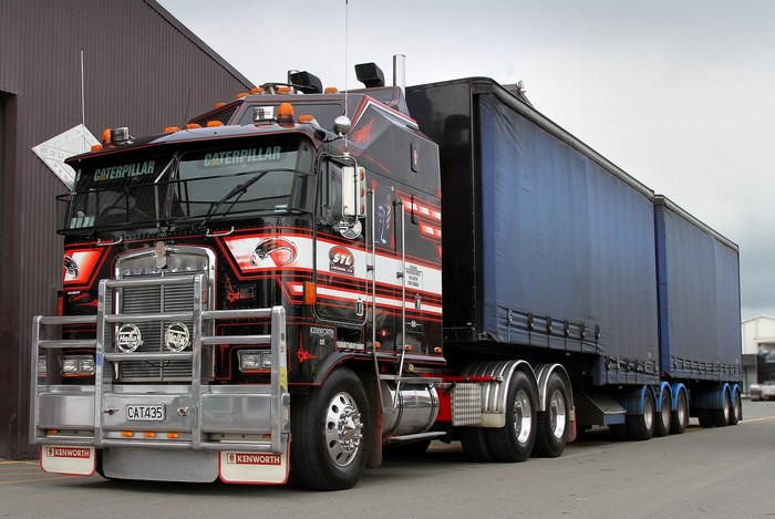 Black Kenworth Truck with Blue Trailer