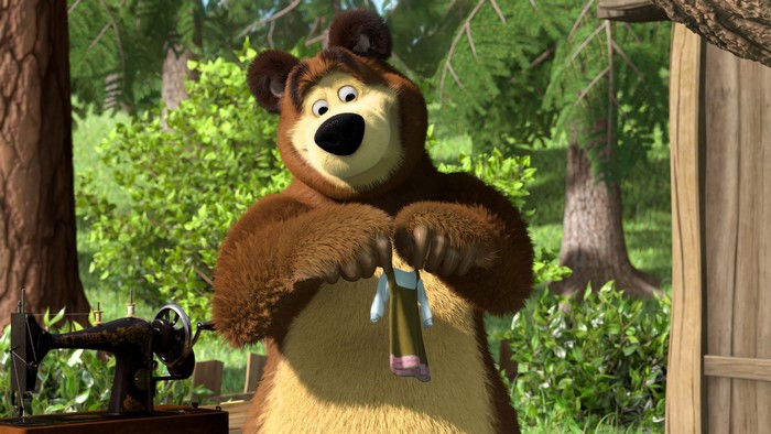 Bear from Masha and the Bear holding a dress