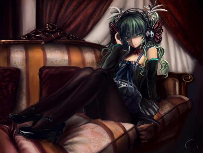 Hatsune Miku from Vocaloid sitting on a couch
