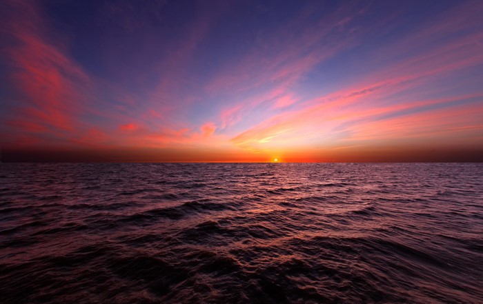 Sunset over the open sea