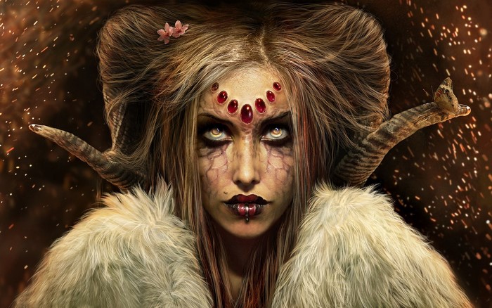 Demon woman with horns and red gems on forehead