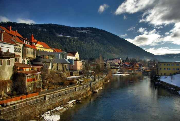 Town on a river with a mountain in Austria