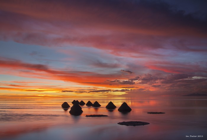Salar de Uyuni sunset with rock formations