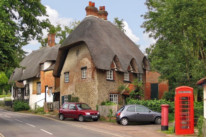 Thatched Cottages and Red Telephone Box in the United Kingdom