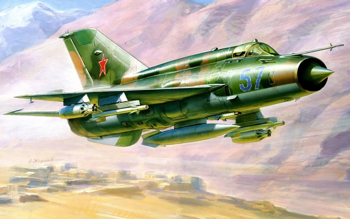 Green Soviet MiG-21 Fighter Jet in Flight