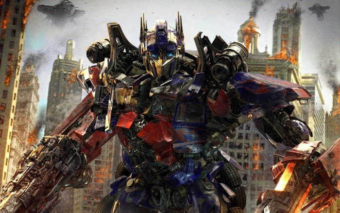 Optimus Prime from Transformers in a burning city