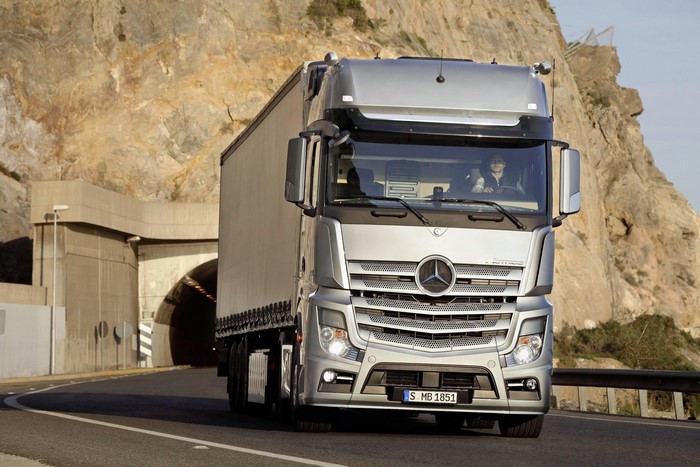 Mercedes-Benz Actros truck driving out of a tunnel