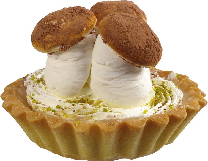 Mushroom-shaped dessert tart with cream and cocoa powder
