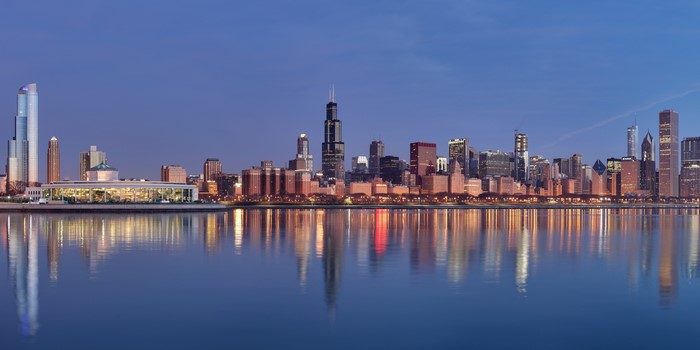 Chicago skyline at dusk with reflections
