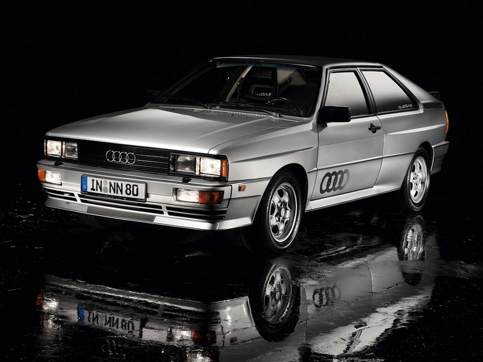 Silver Audi Quattro car on a wet surface