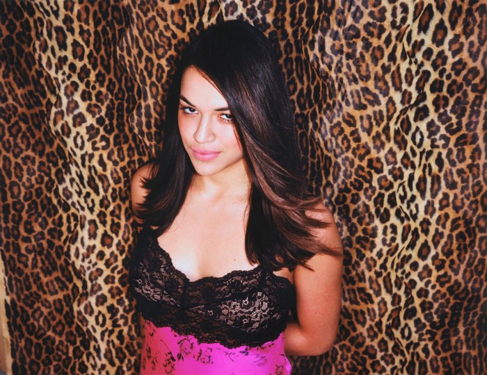 Michelle Rodriguez in front of leopard print
