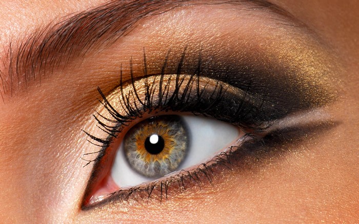 Close-up of a woman's eye with dramatic makeup