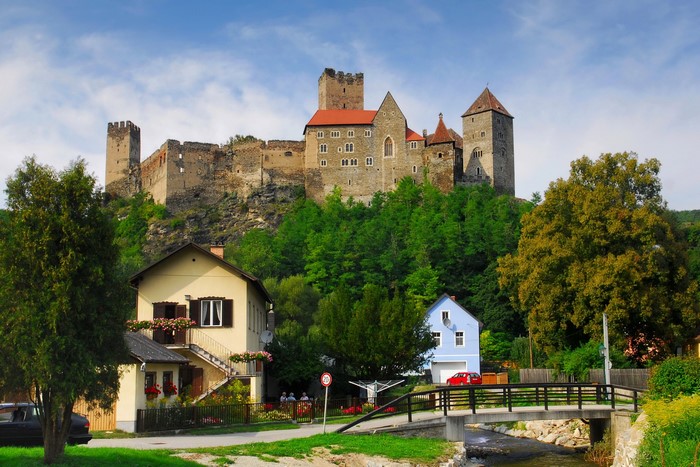 Hardegg Castle in Austria above a village and river