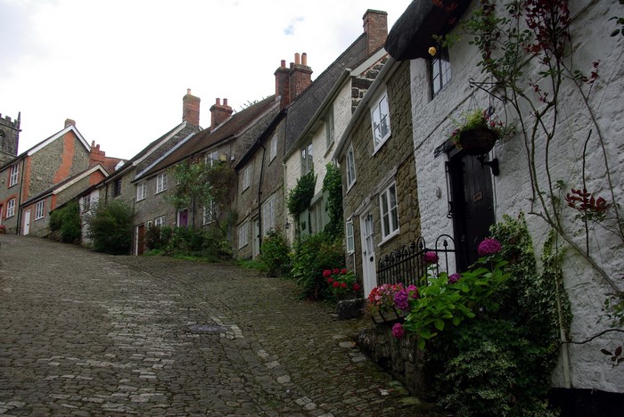 Cobblestone street with historic houses in the United Kingdom