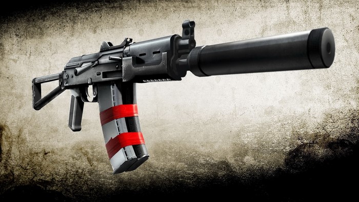 Assault rifle with suppressor and custom magazine
