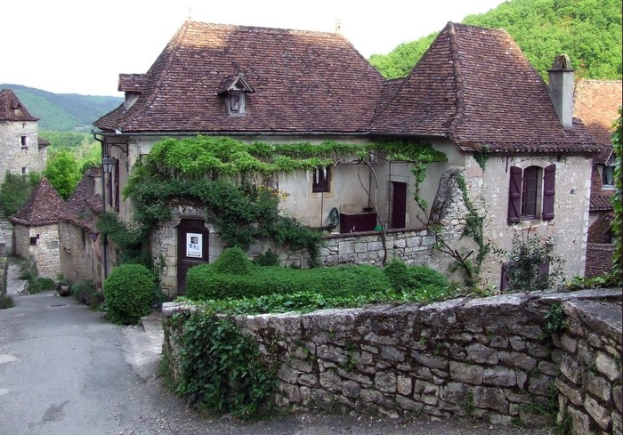 Stone houses with tiled roofs in a French village