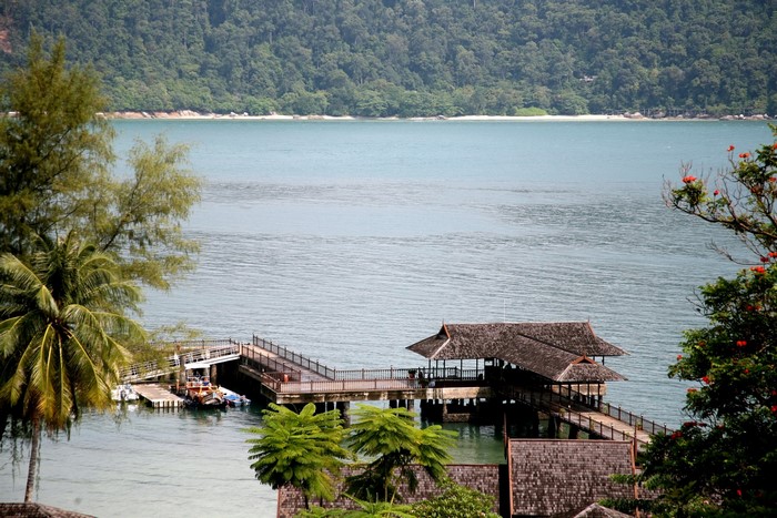 Pier with traditional roofs over the water