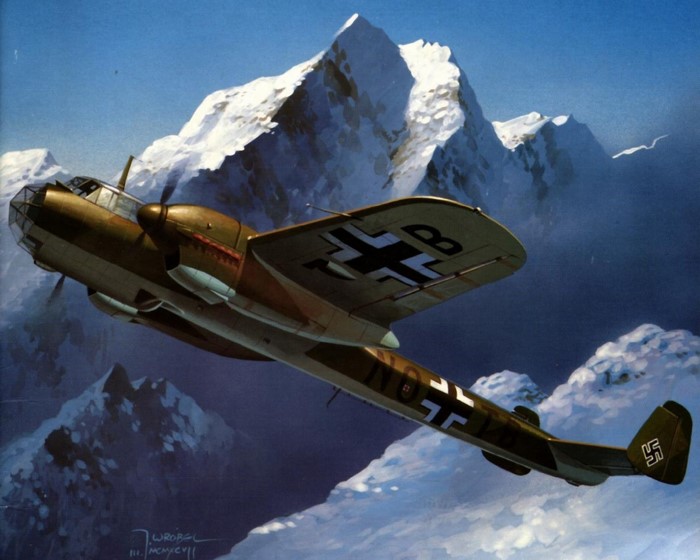 WWII German Bomber Aircraft Flying Over Snowy Mountains