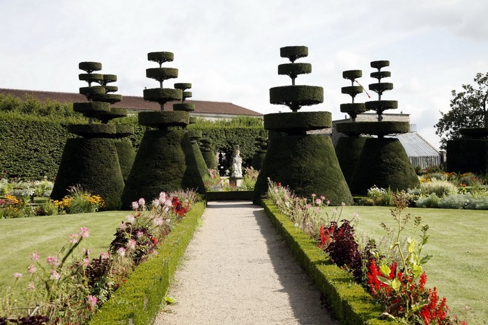 Topiary garden with sculpted bushes and flowers