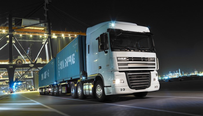 4K DAF Trucks at a Port at Night