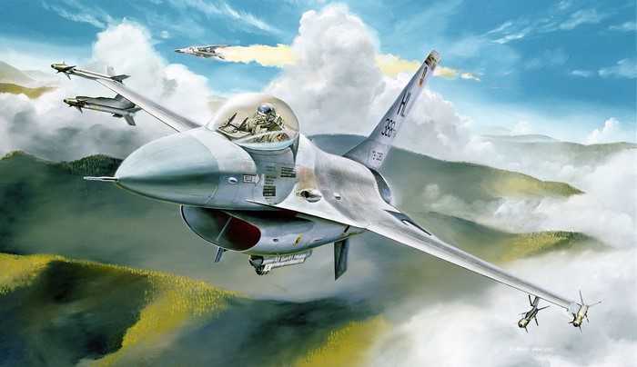 F-16 fighter jet flying over mountains