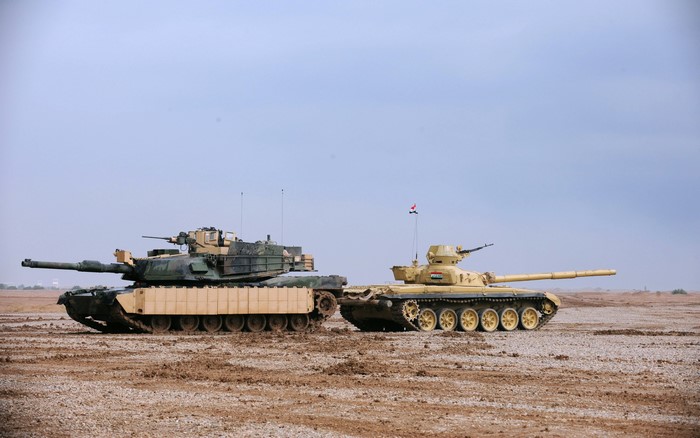 M1 Abrams and T-72 tanks in a desert